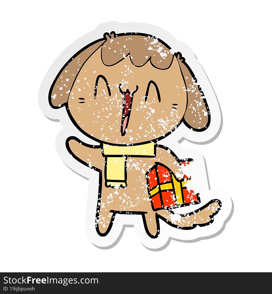 Distressed Sticker Of A Cute Cartoon Dog With Christmas Present