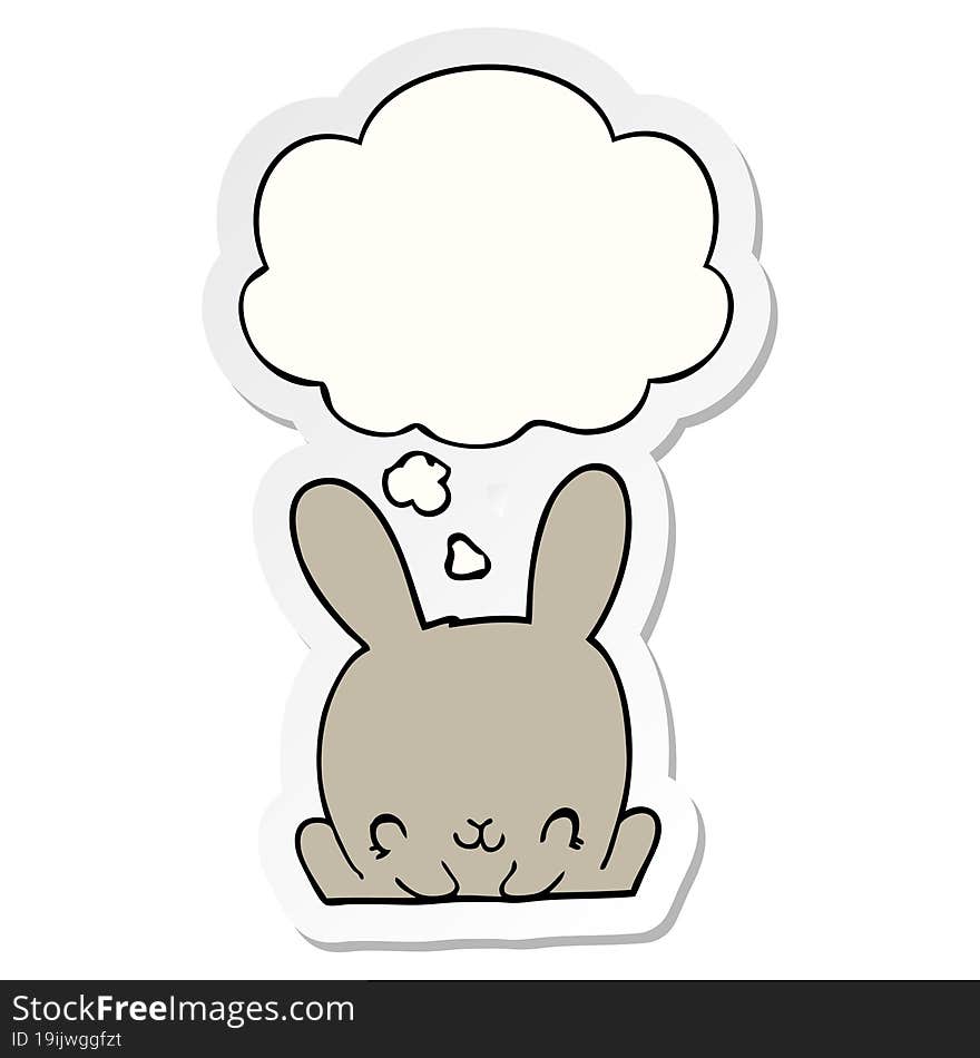 cartoon rabbit and thought bubble as a printed sticker