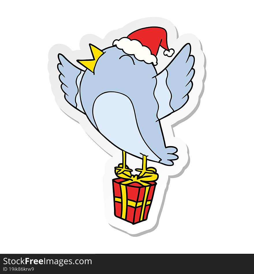 sticker cartoon of a bird wearing santa hat