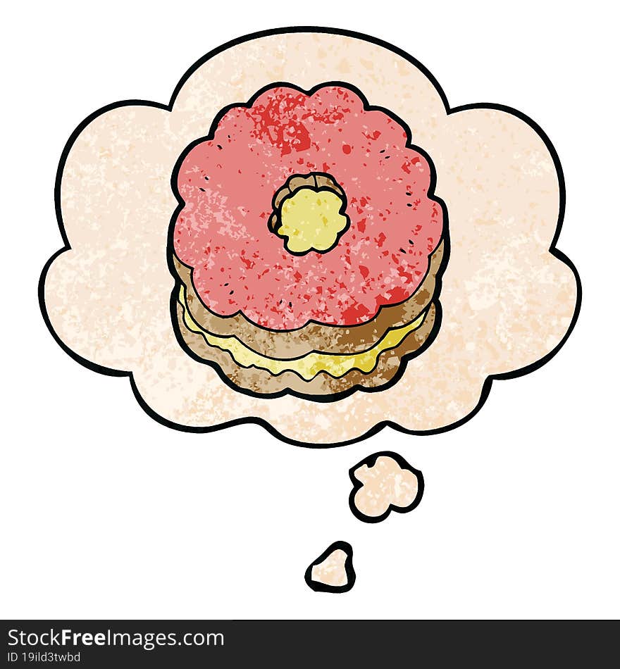 cartoon biscuit with thought bubble in grunge texture style. cartoon biscuit with thought bubble in grunge texture style