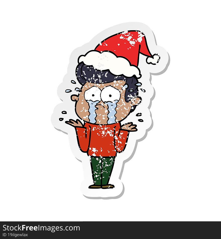 distressed sticker cartoon of a crying man wearing santa hat