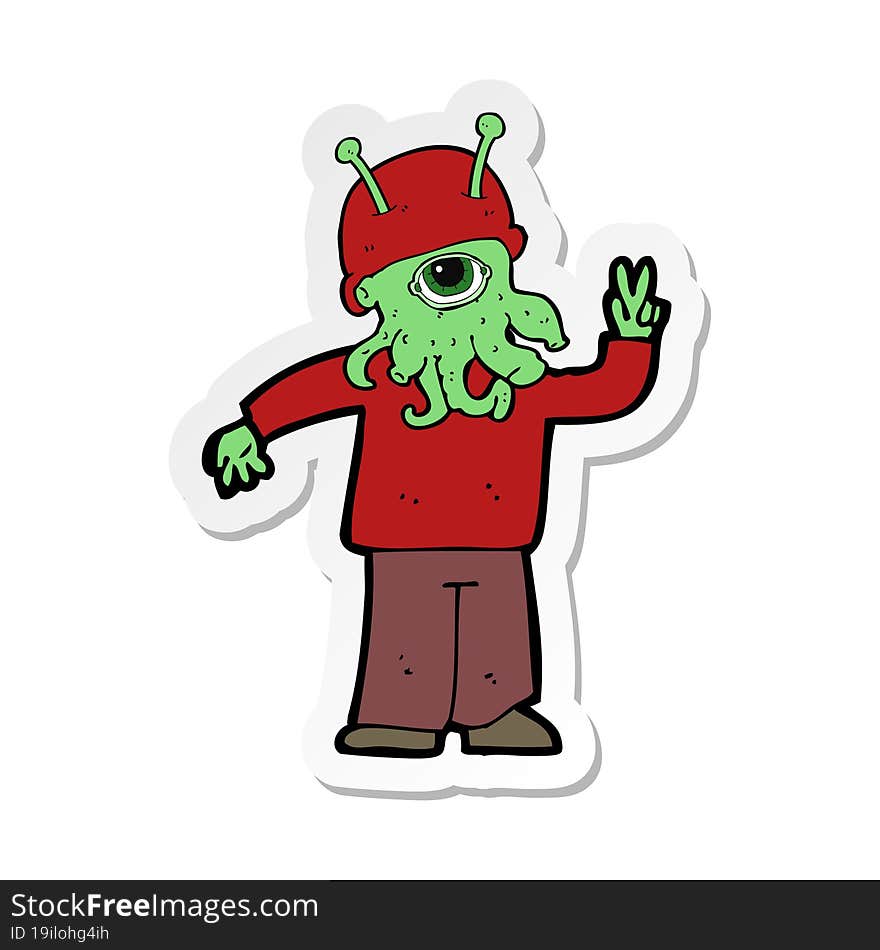 sticker of a cartoon space alien