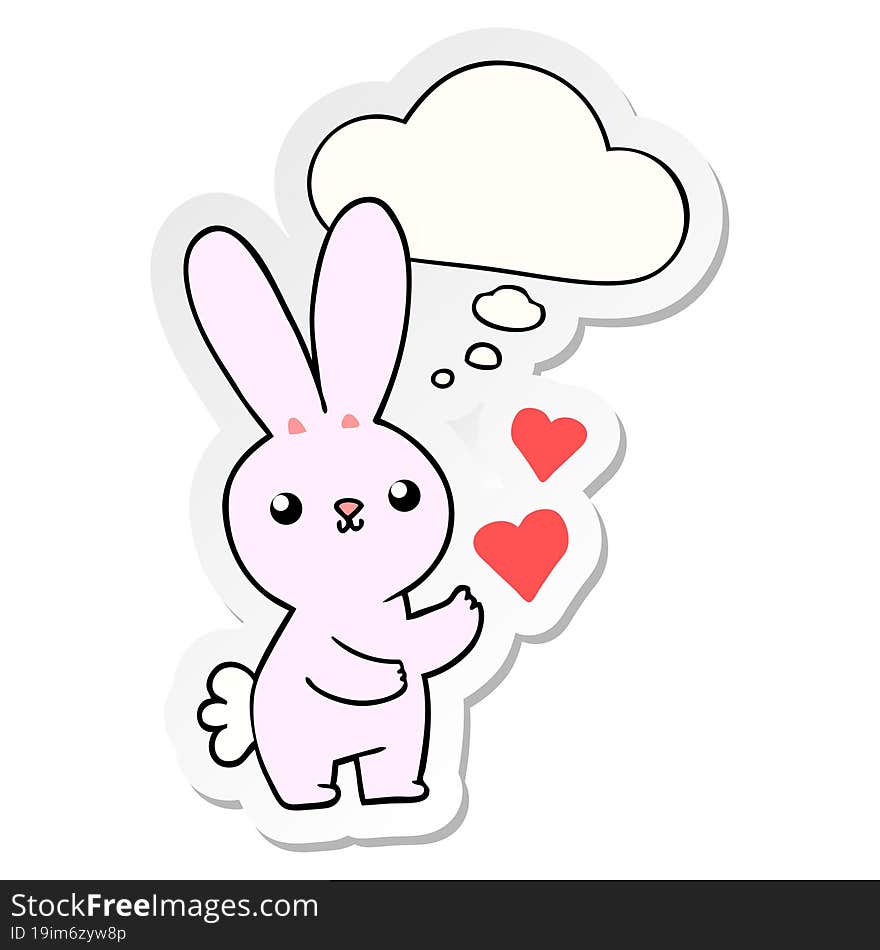 cute cartoon rabbit with love hearts with thought bubble as a printed sticker