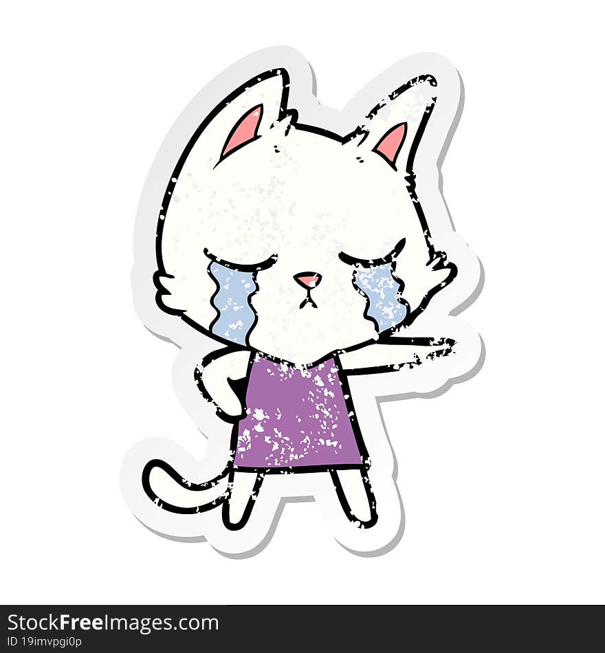 distressed sticker of a crying cartoon cat in dress pointing