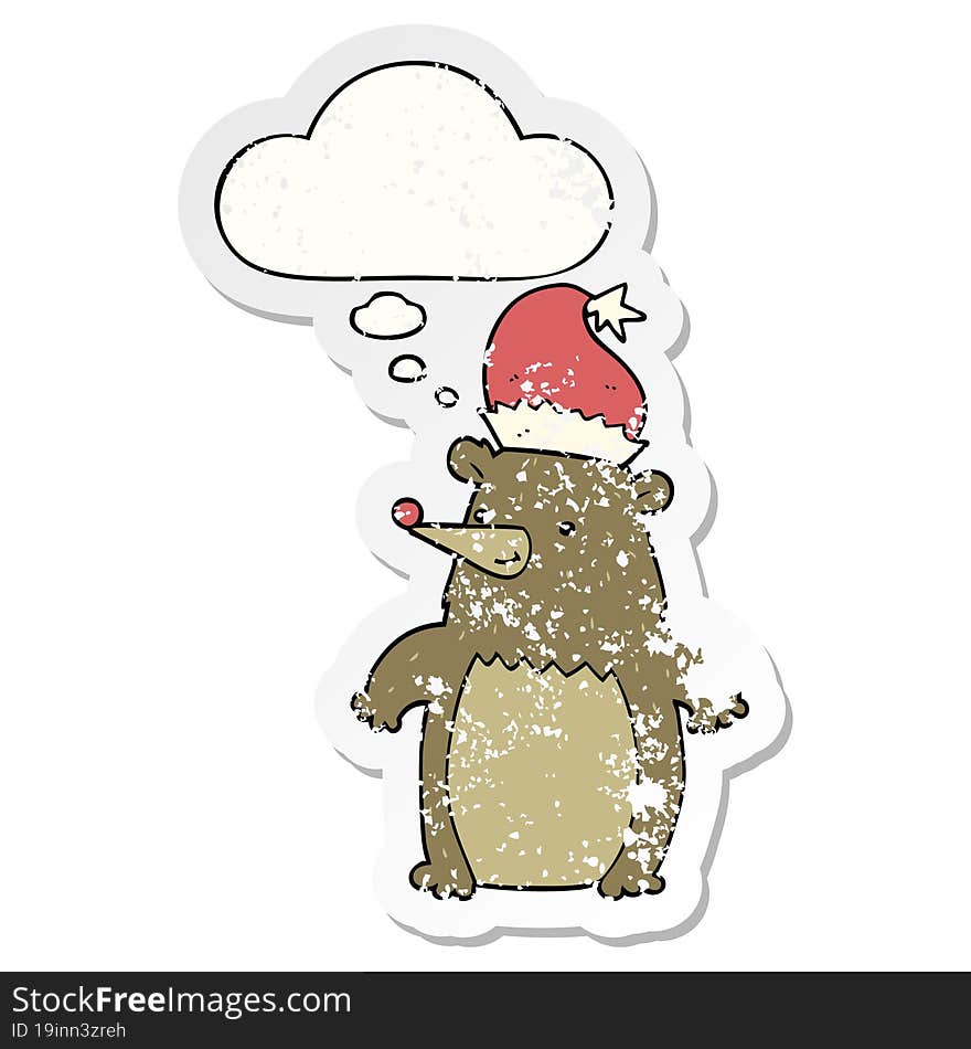 cartoon bear wearing christmas hat and thought bubble as a distressed worn sticker