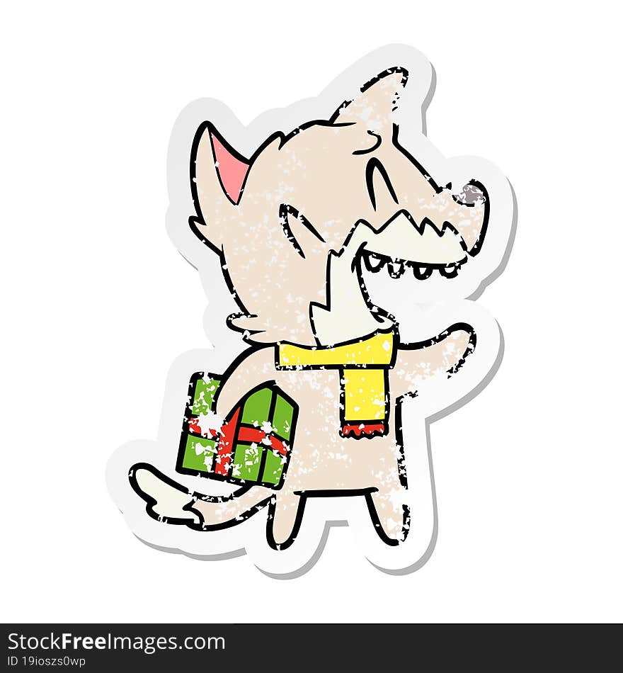 distressed sticker of a laughing christmas fox cartoon