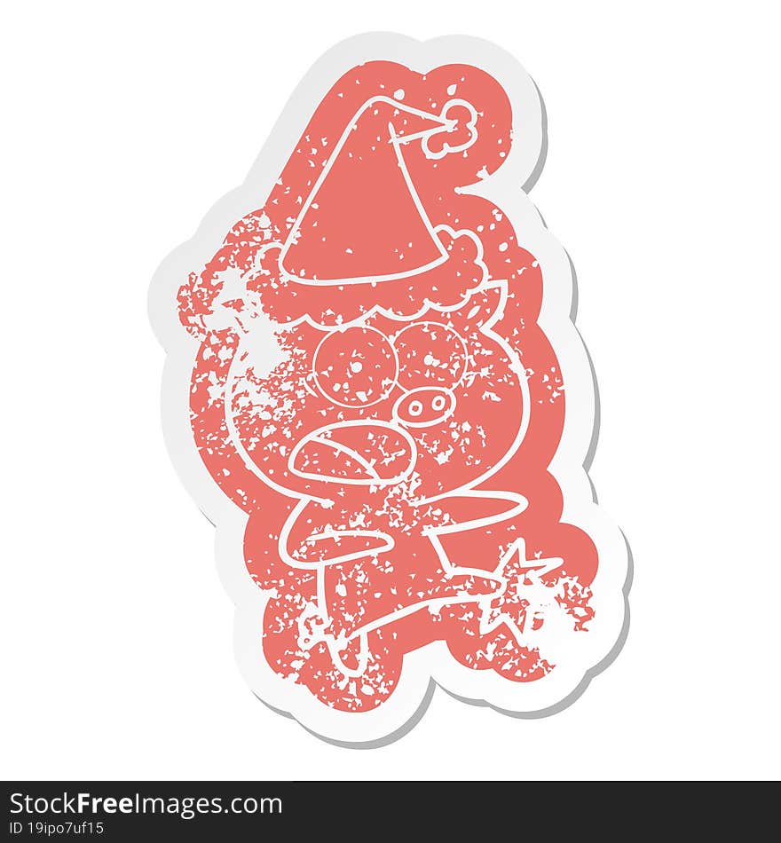 Cartoon Distressed Sticker Of A Pig Shouting And Kicking Wearing Santa Hat