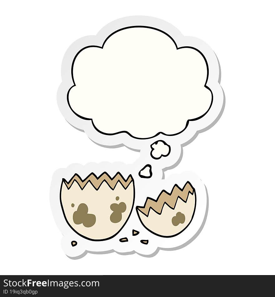 cartoon cracked egg with thought bubble as a printed sticker