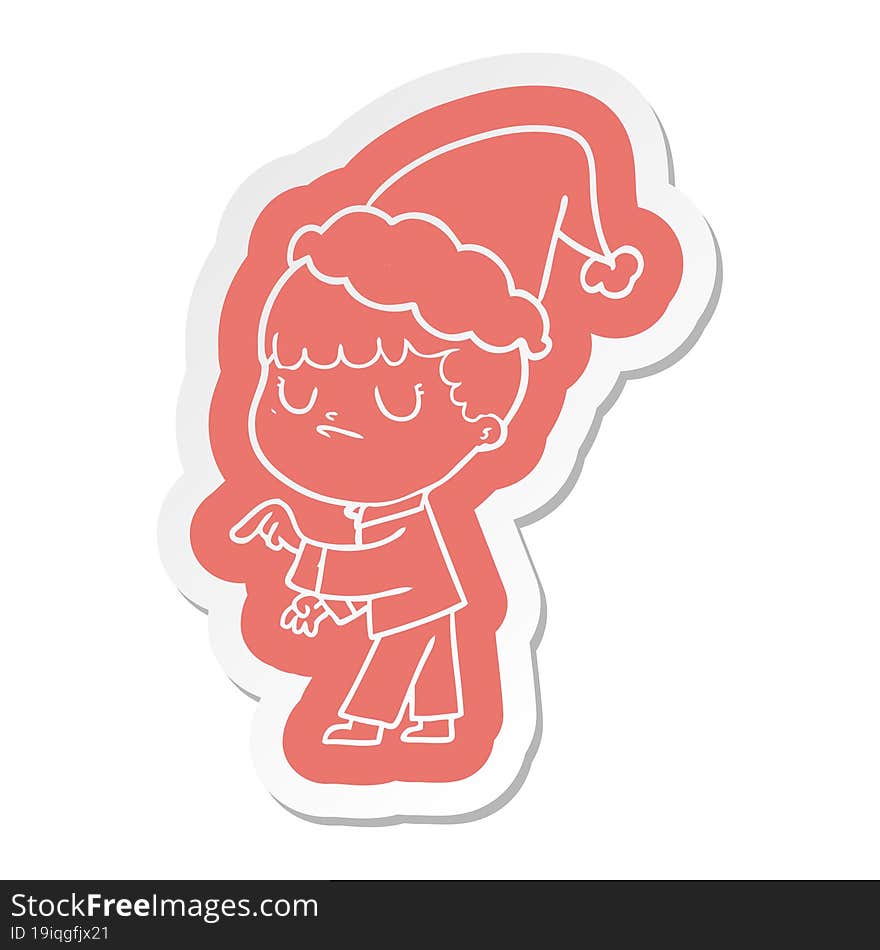 cartoon  sticker of a grumpy boy wearing santa hat