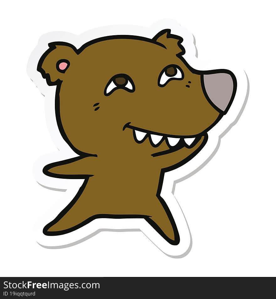 sticker of a cartoon bear showing teeth