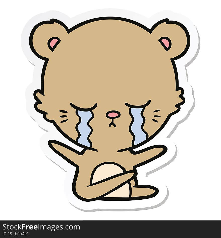 sticker of a crying cartoon bear