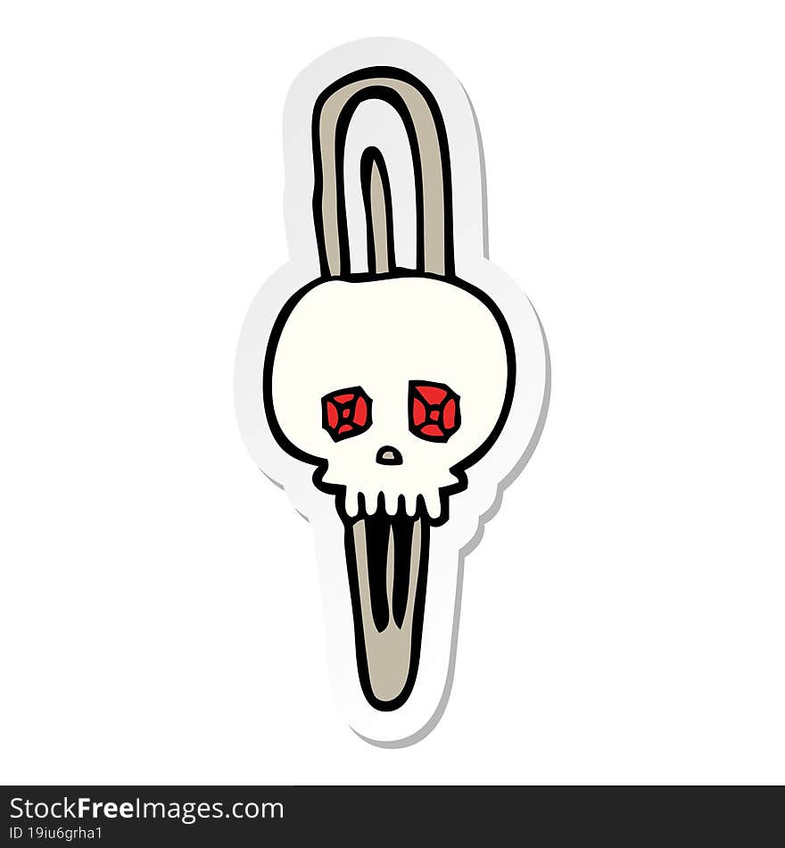 sticker of a cartoon skull hairclip