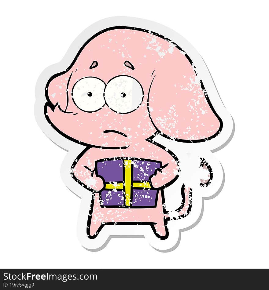 distressed sticker of a cartoon unsure elephant with christmas present