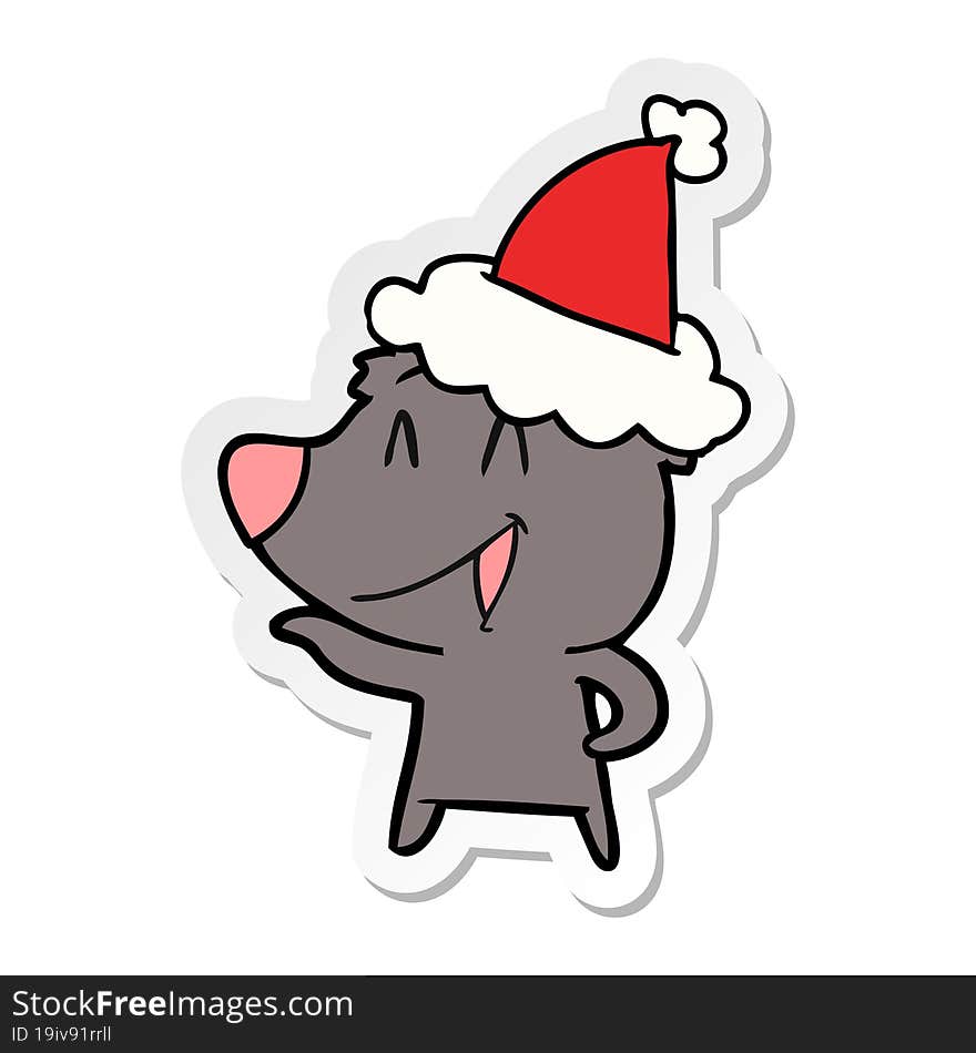 laughing bear sticker cartoon of a wearing santa hat