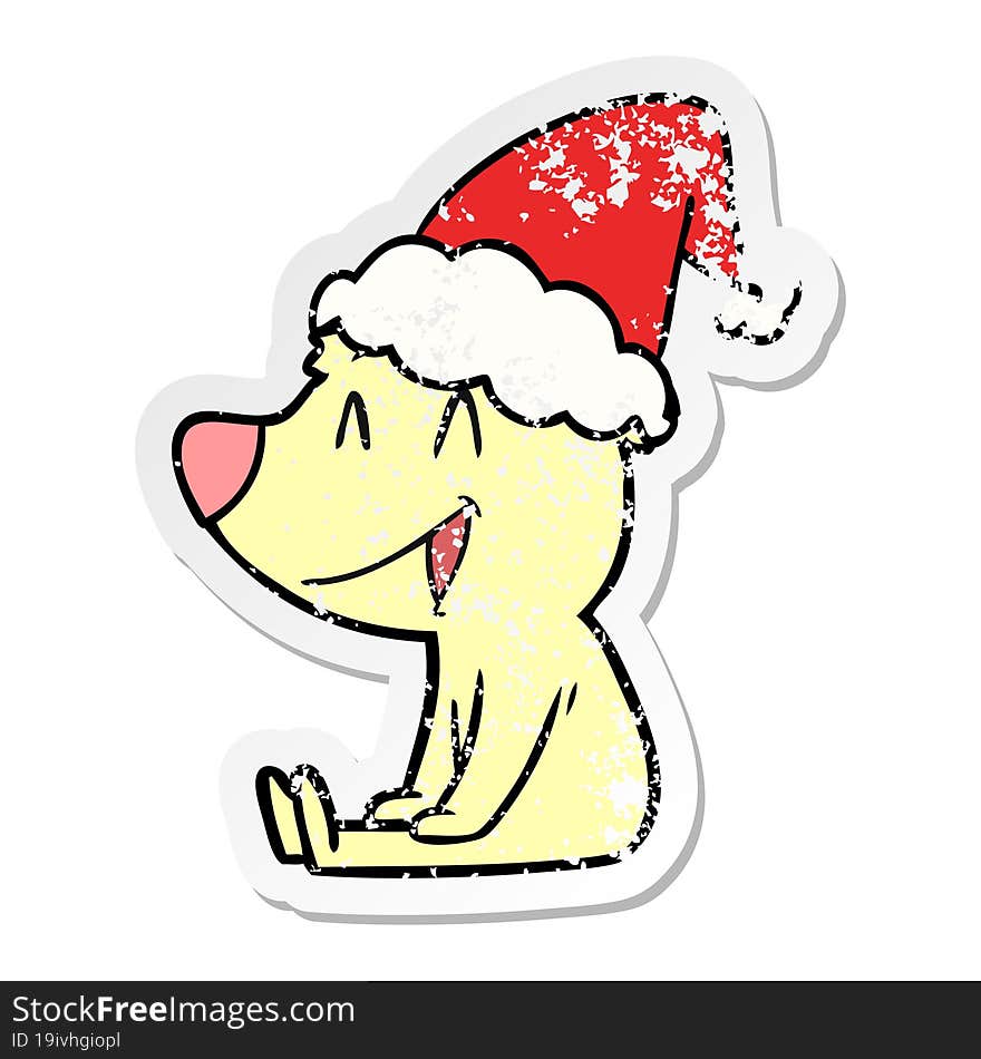 sitting bear distressed sticker cartoon of a wearing santa hat