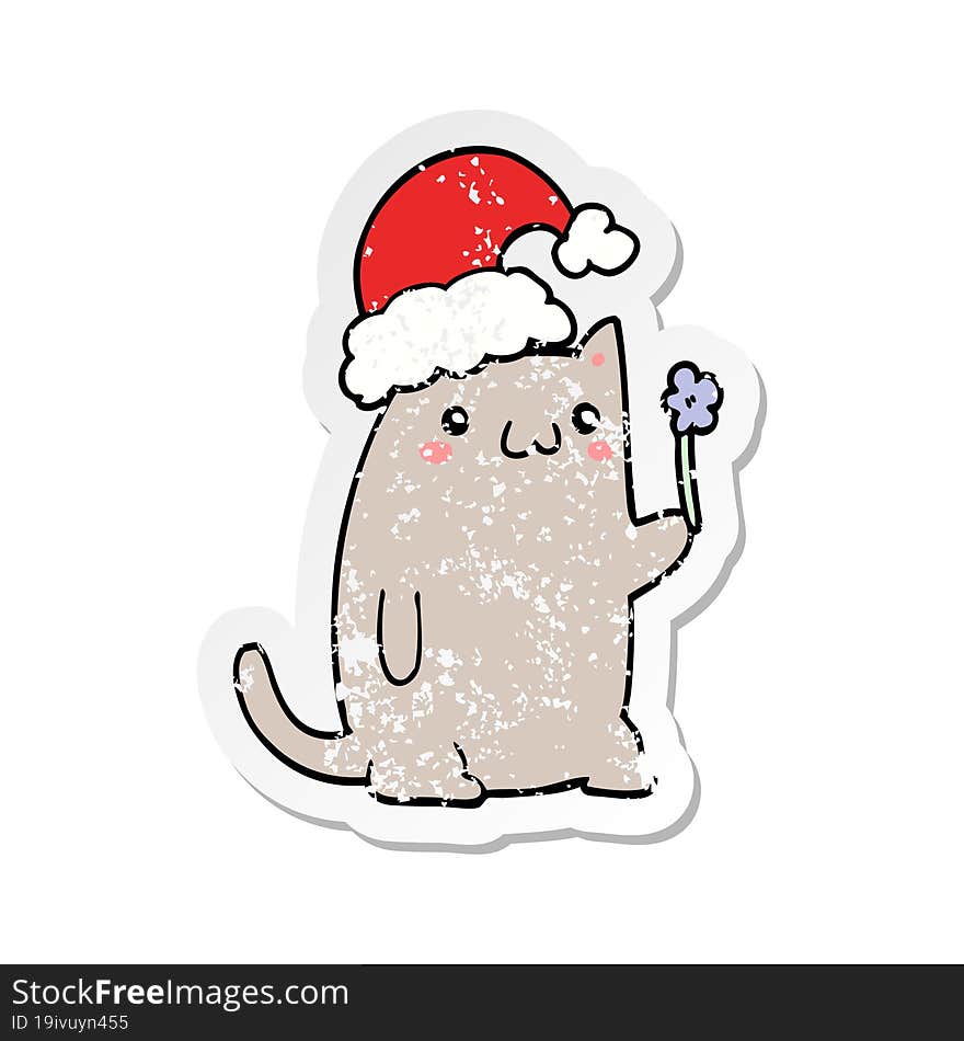 distressed sticker of a cute cartoon christmas cat