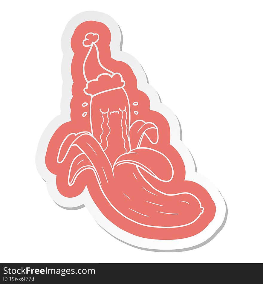 quirky cartoon  sticker of a crying banana wearing santa hat