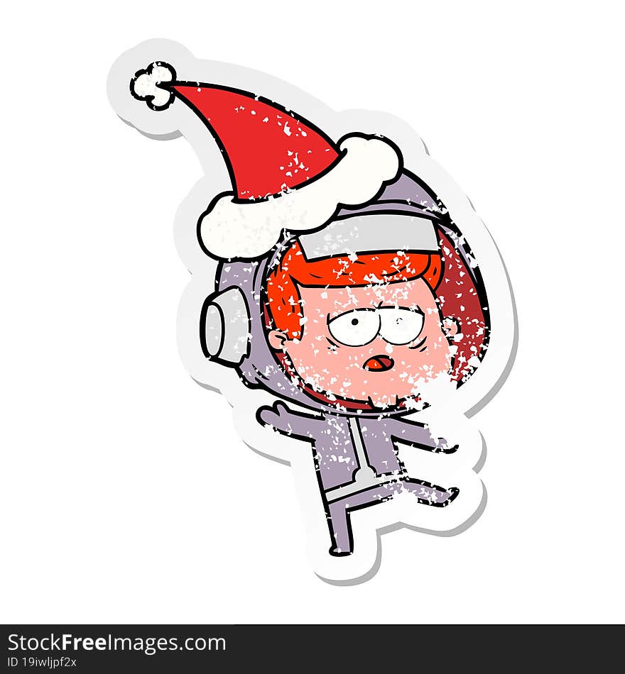 distressed sticker cartoon of a tired astronaut wearing santa hat