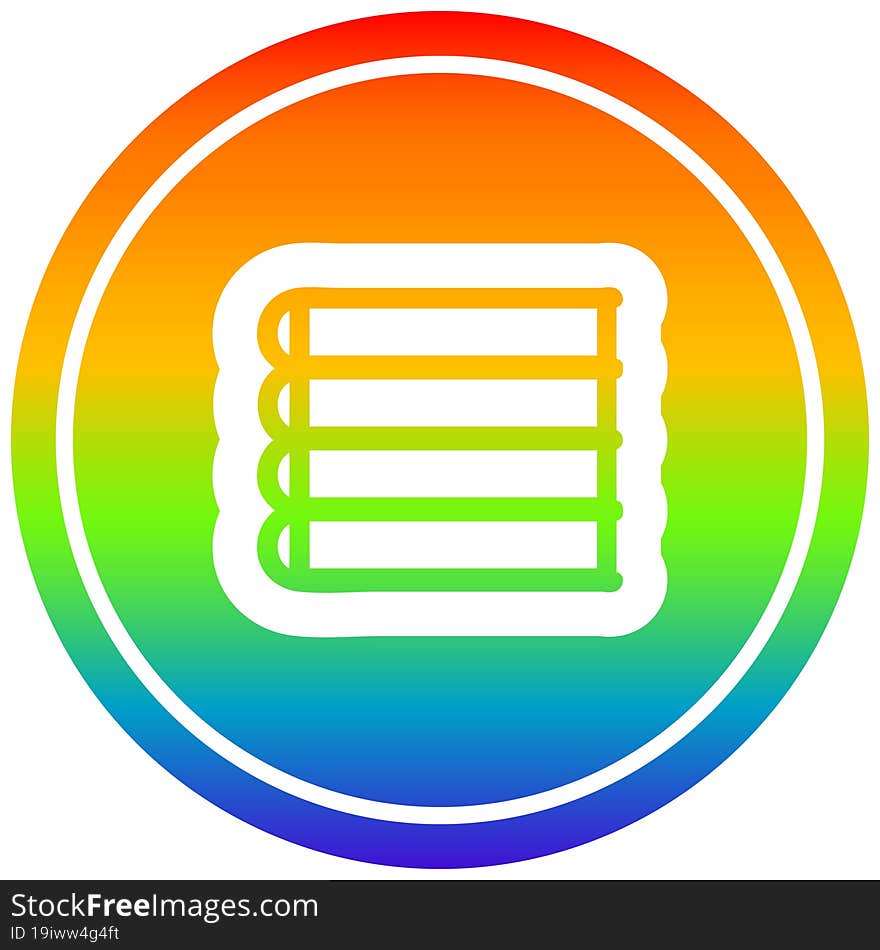 stack of books circular in rainbow spectrum