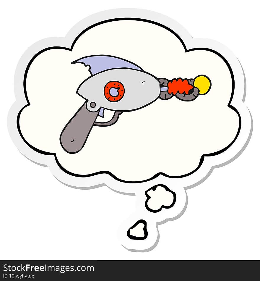 cartoon ray gun with thought bubble as a printed sticker