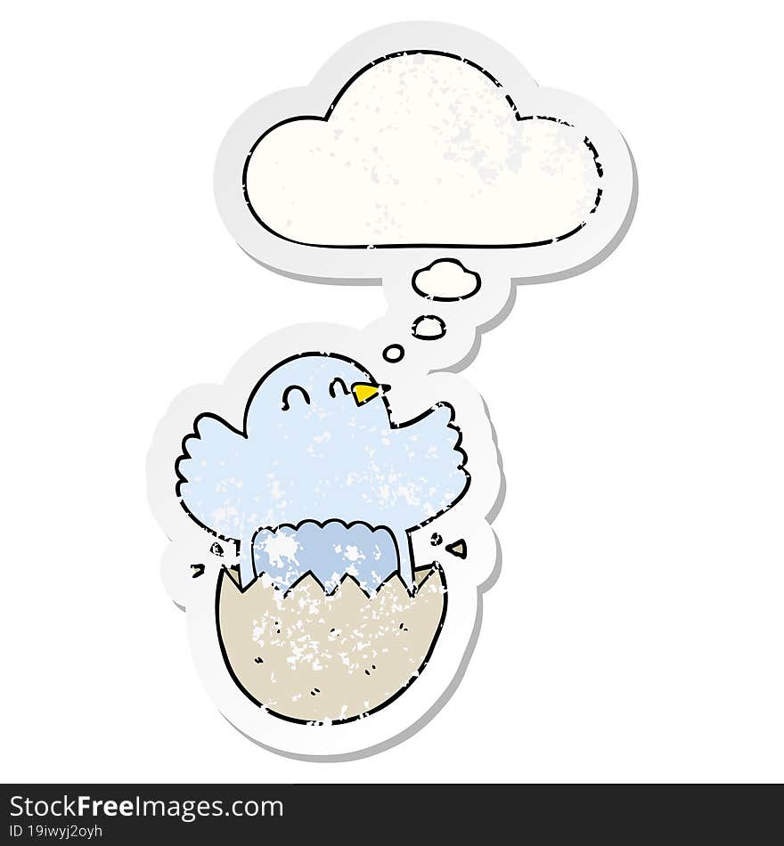 cartoon hatching chicken with thought bubble as a distressed worn sticker