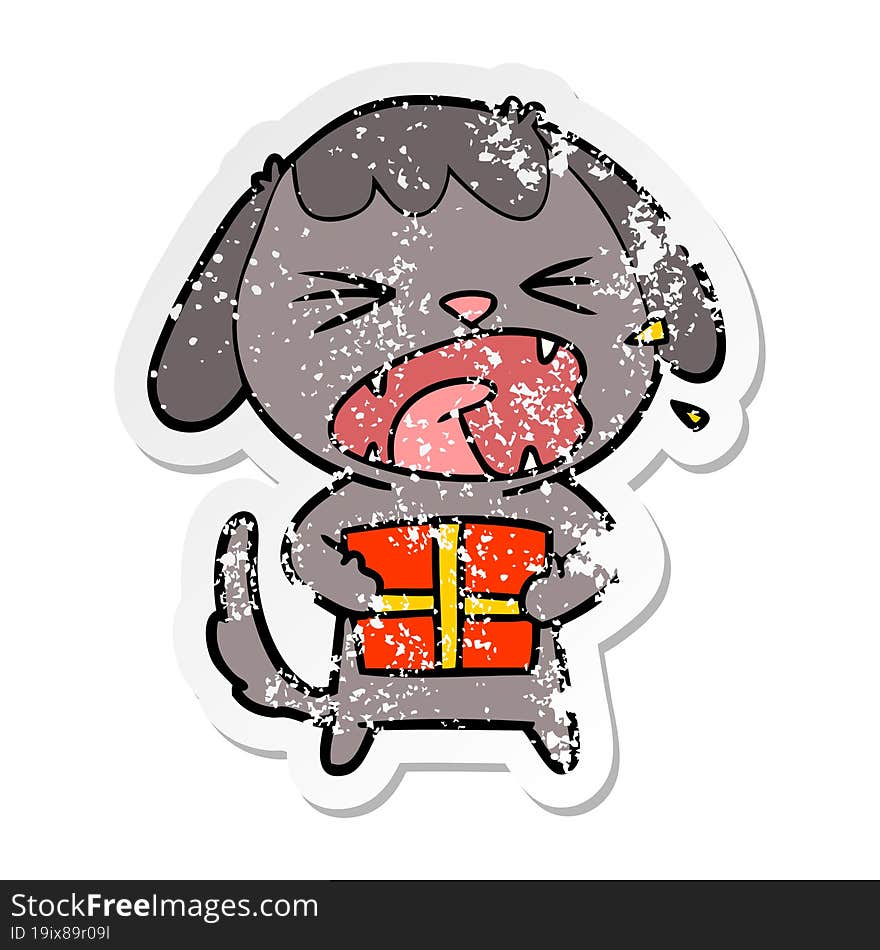 distressed sticker of a cute cartoon dog with christmas present