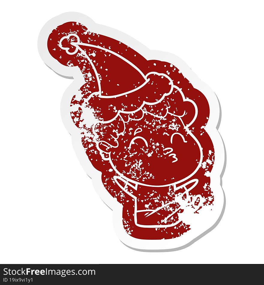 quirky cartoon distressed sticker of a man pouting wearing santa hat