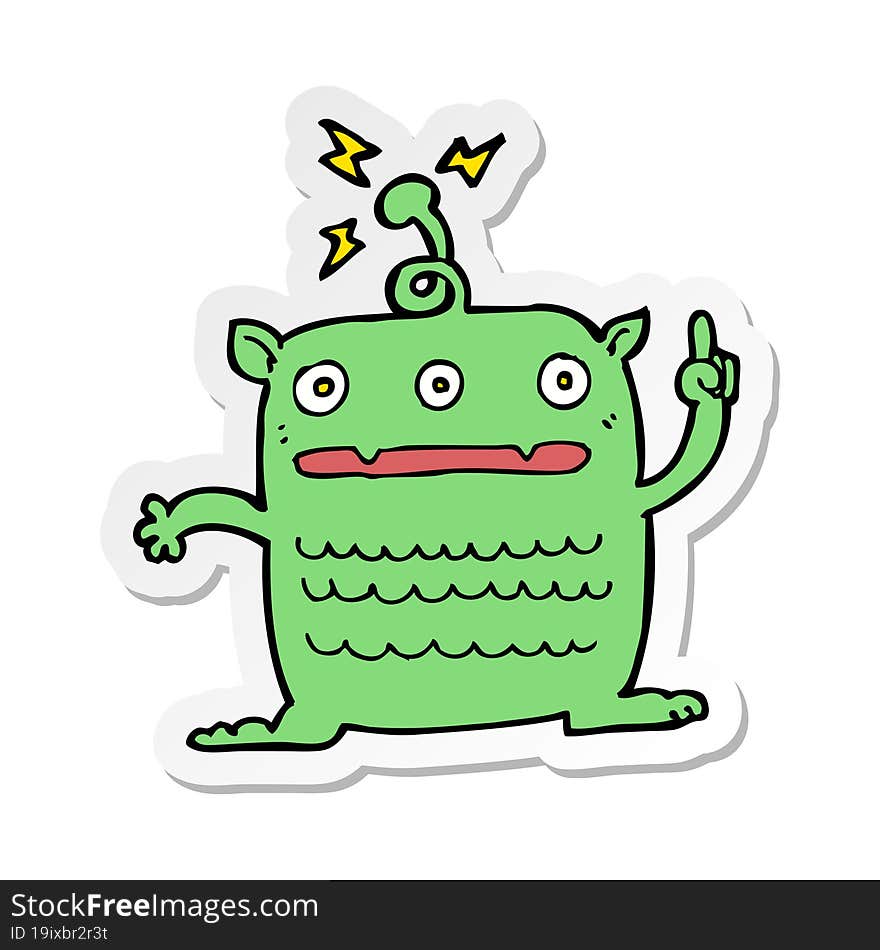 sticker of a cartoon weird little alien