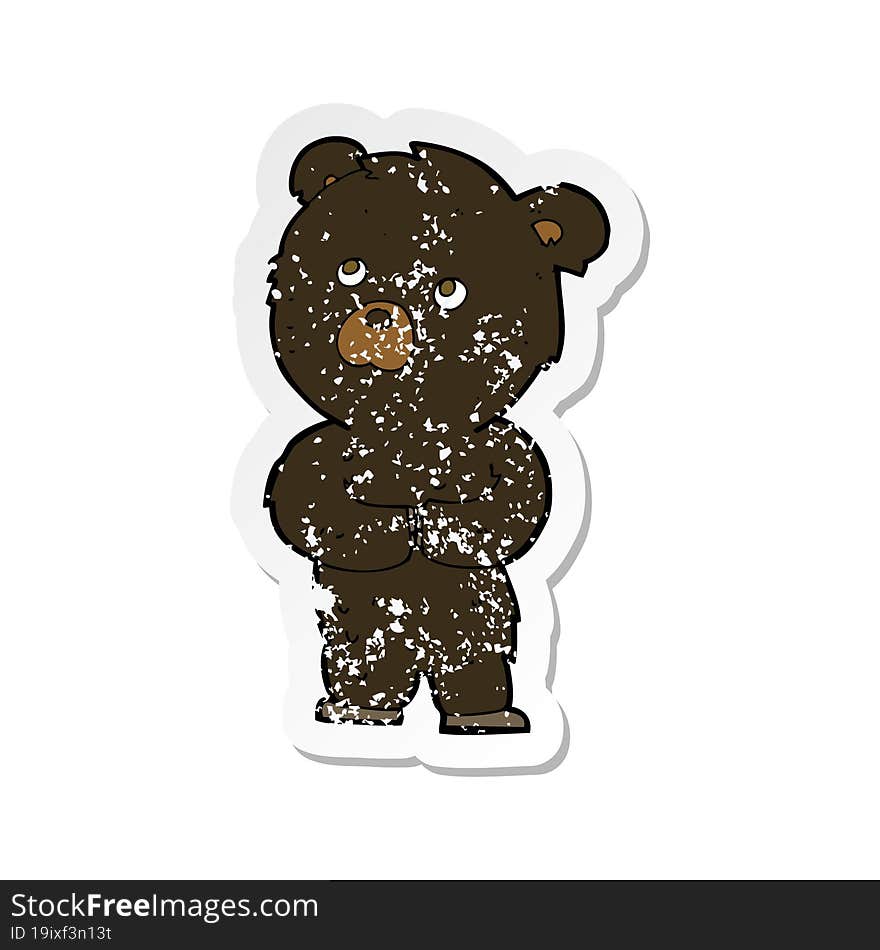 retro distressed sticker of a cartoon black bear cub