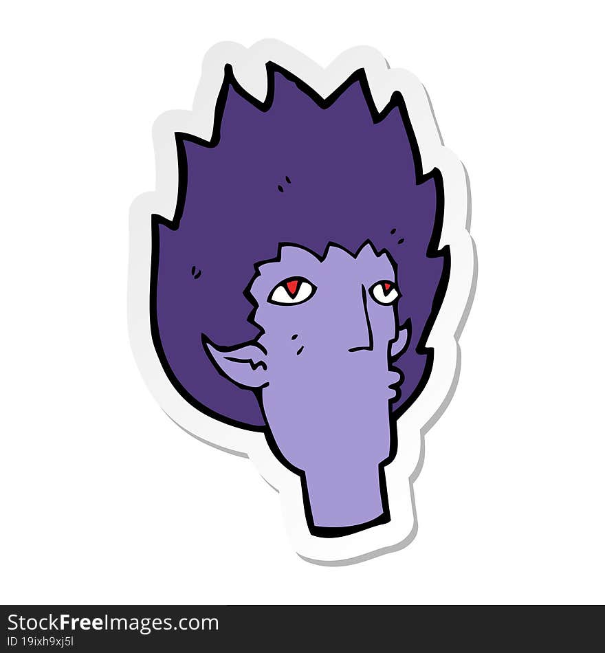 sticker of a cartoon vampire face