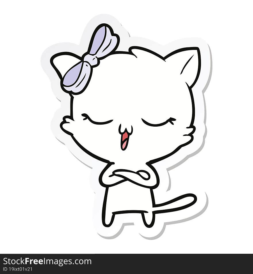 sticker of a cartoon cat with bow on head