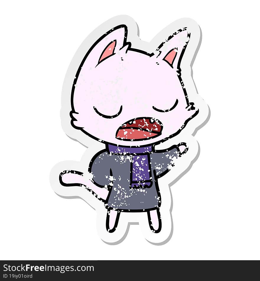 Distressed Sticker Of A Talking Cat Wearing Winter Clothes