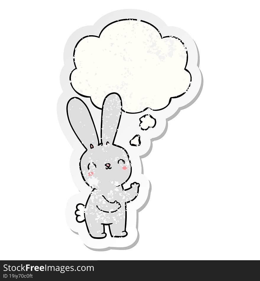 cute cartoon rabbit and thought bubble as a distressed worn sticker