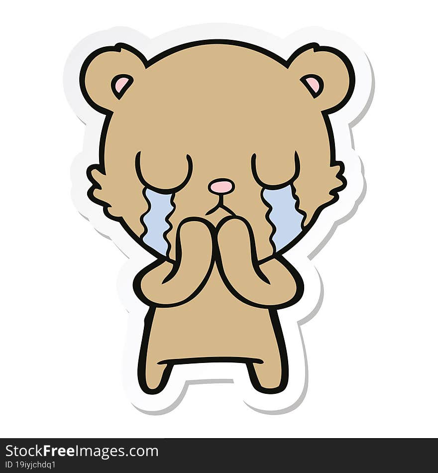 sticker of a crying cartoon bear