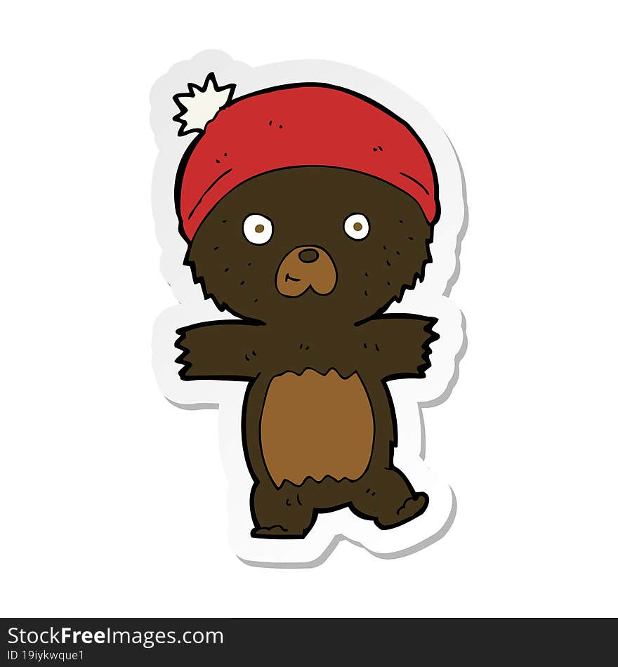 sticker of a cartoon cute black bear