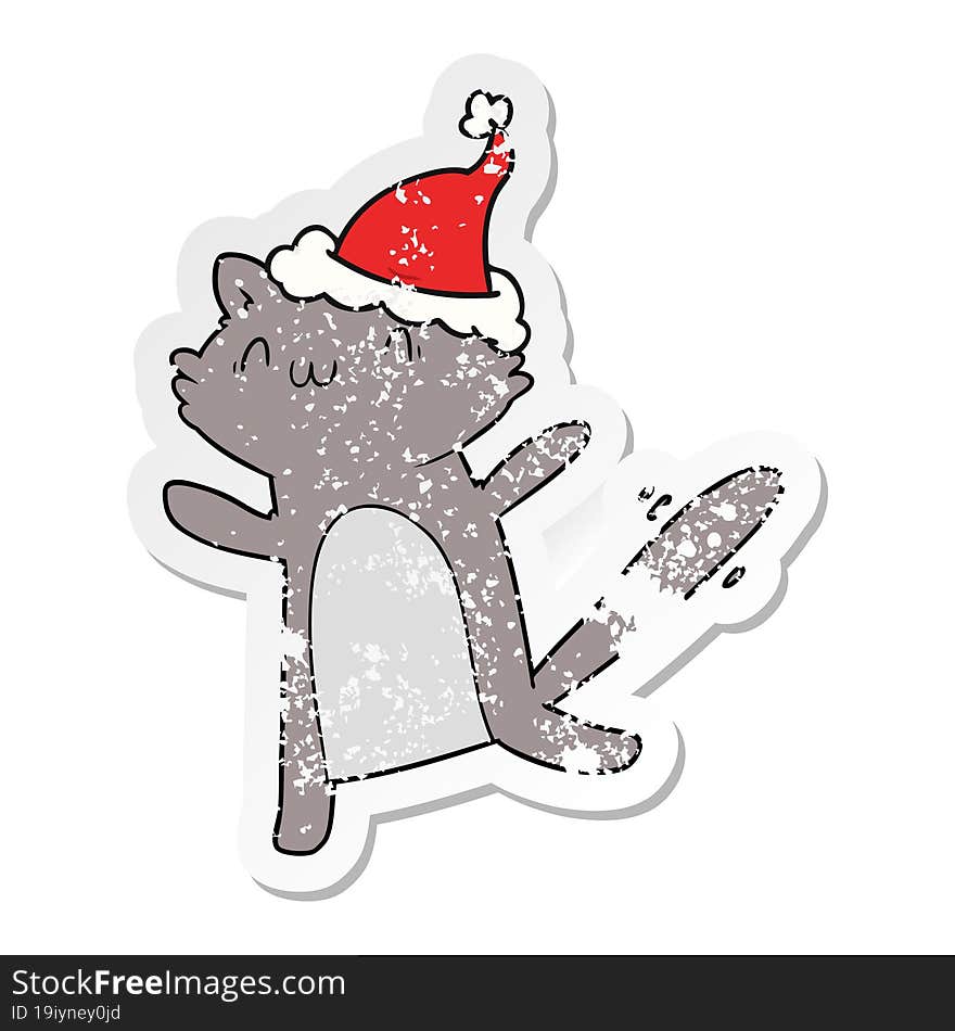 hand drawn distressed sticker cartoon of a dancing cat wearing santa hat