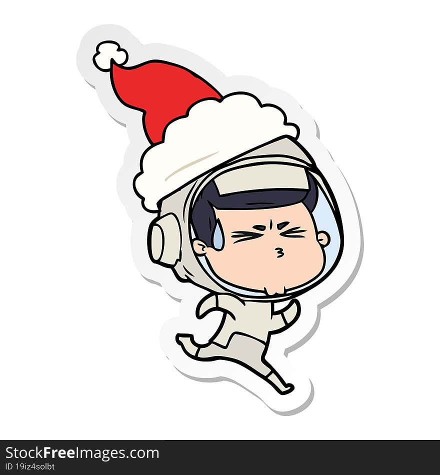 sticker cartoon of a stressed astronaut wearing santa hat