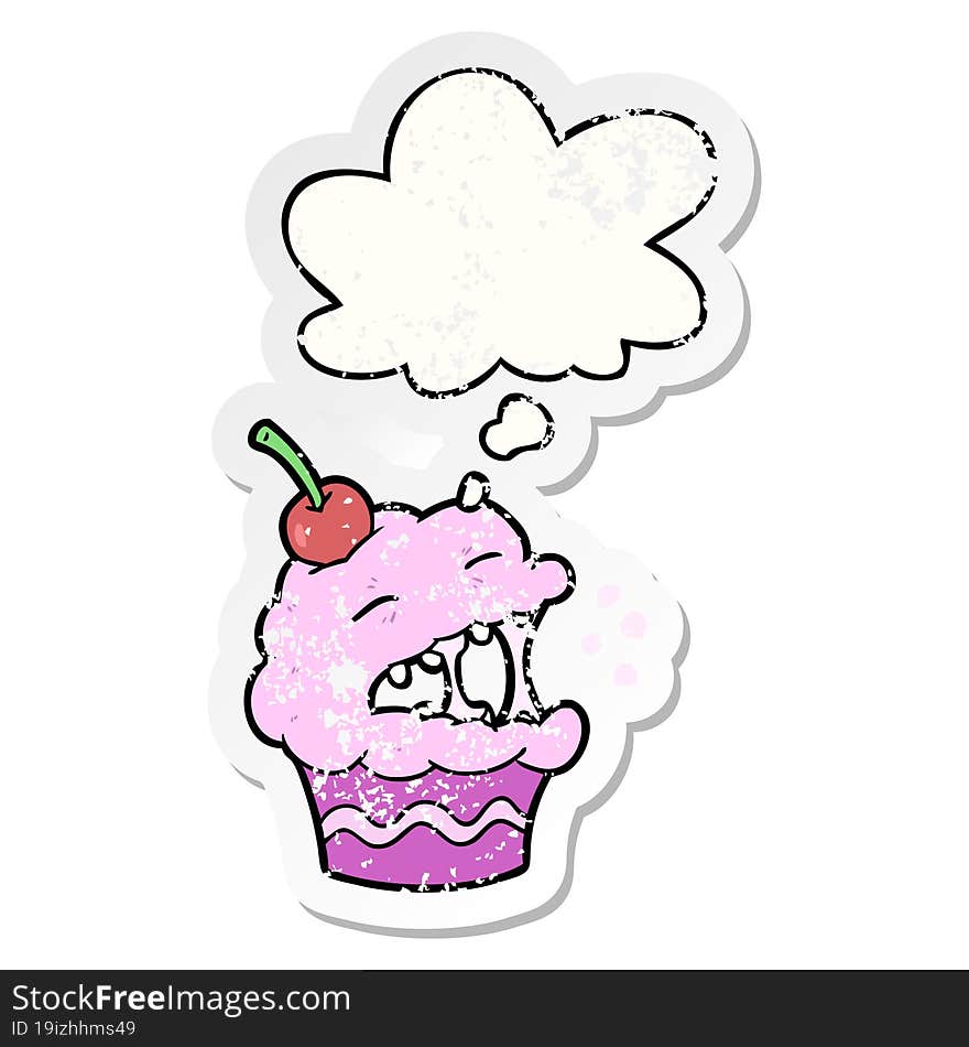 Cartoon Cupcake And Thought Bubble As A Distressed Worn Sticker