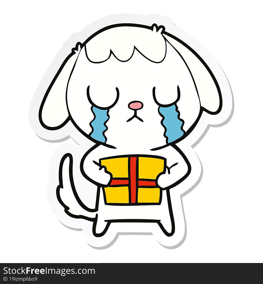 sticker of a cute cartoon dog with christmas present