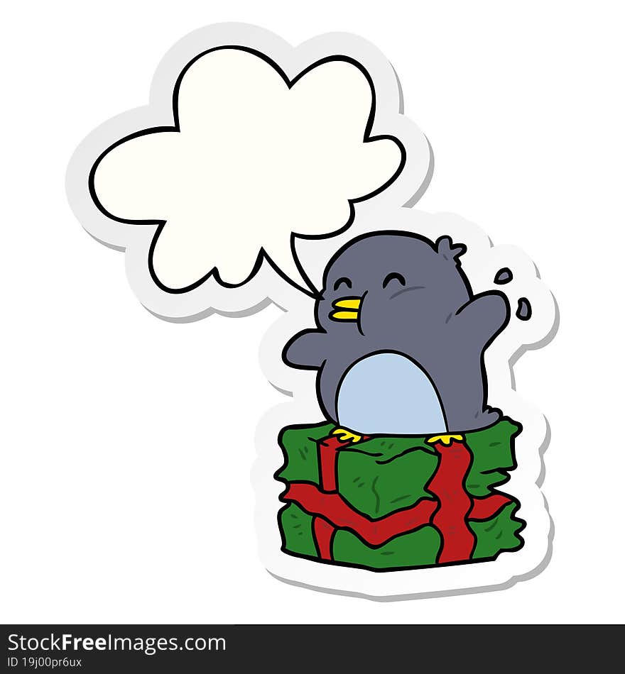 cartoon penguin on wrapped present with speech bubble sticker