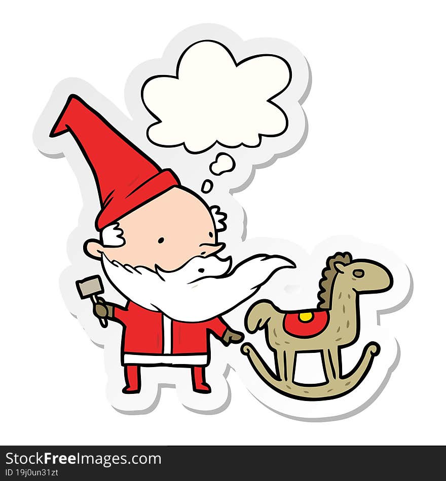 cartoon santa making toy with thought bubble as a printed sticker