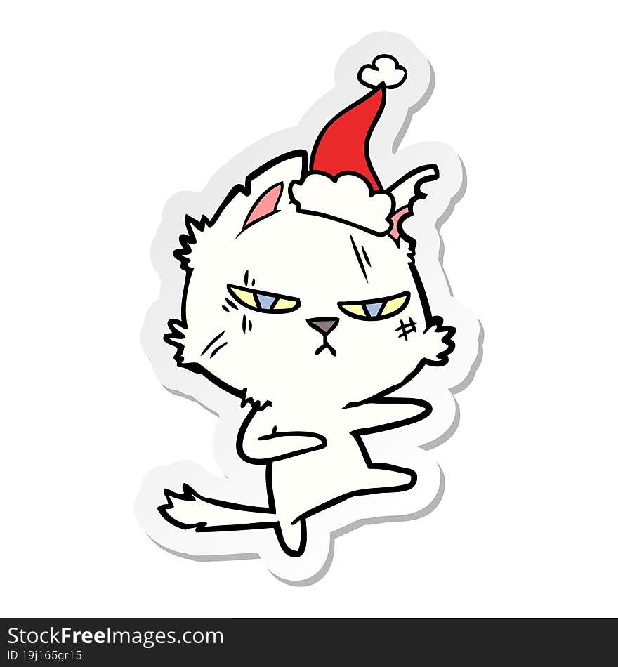 tough sticker cartoon of a cat wearing santa hat