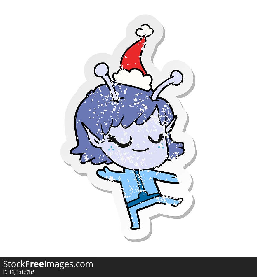 Smiling Alien Girl Distressed Sticker Cartoon Of A Wearing Santa Hat