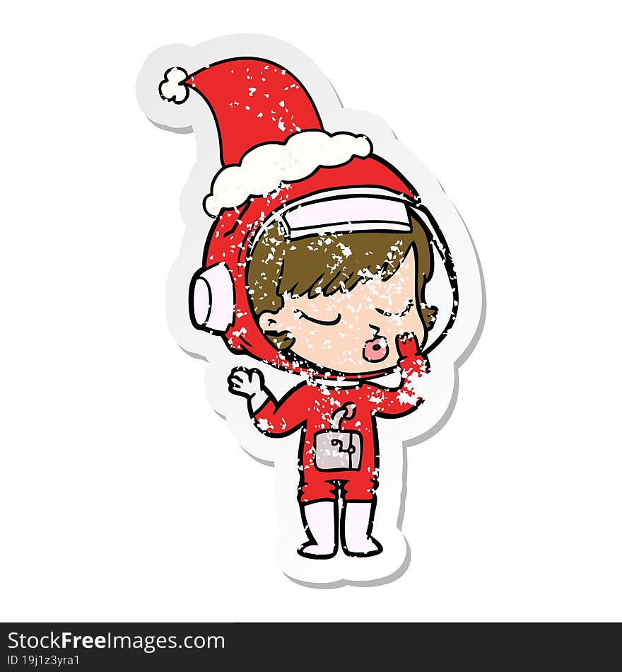 distressed sticker cartoon of a pretty astronaut girl wearing santa hat