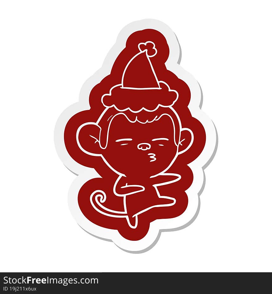 cartoon  sticker of a suspicious monkey wearing santa hat