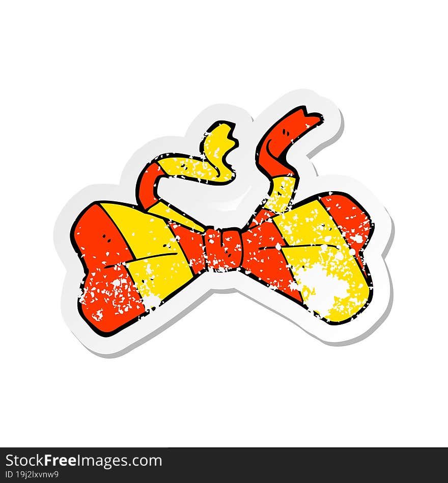 retro distressed sticker of a cartoon bow tie