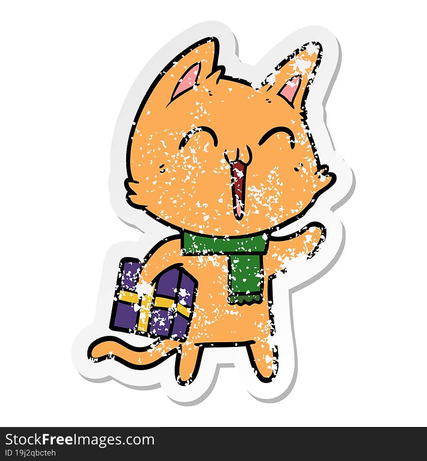 distressed sticker of a happy cartoon cat with christmas gift