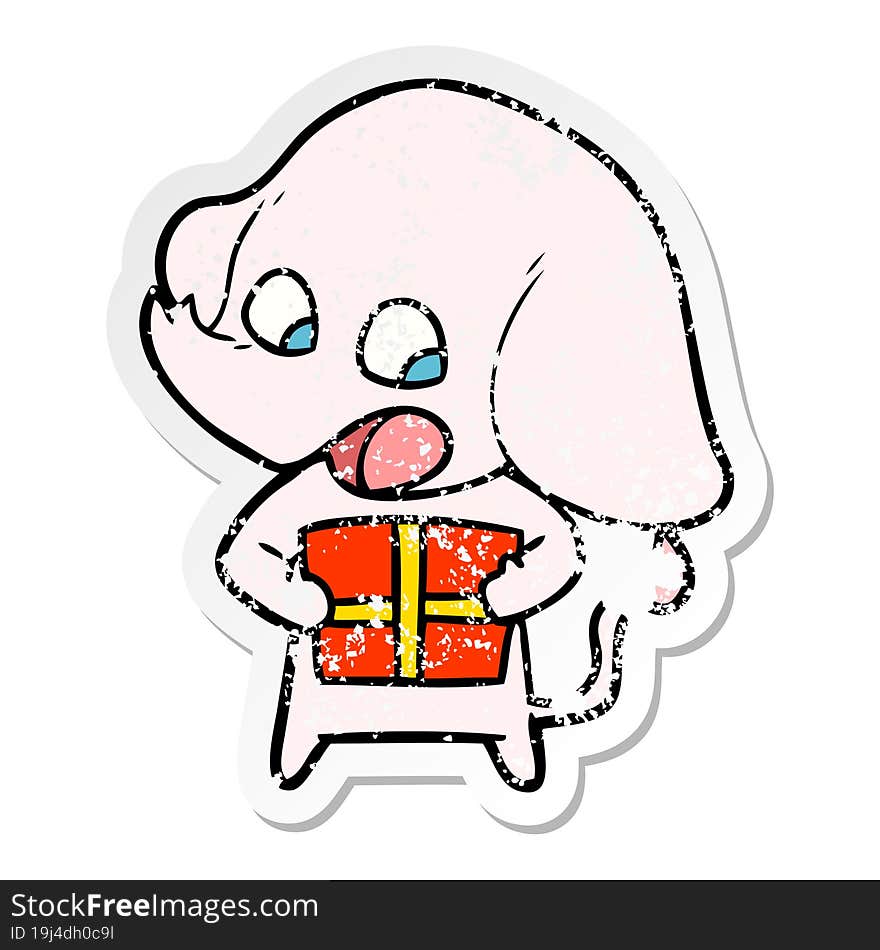 distressed sticker of a cute cartoon elephant with christmas present