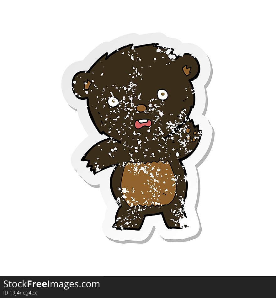 retro distressed sticker of a cartoon waving black bear cub