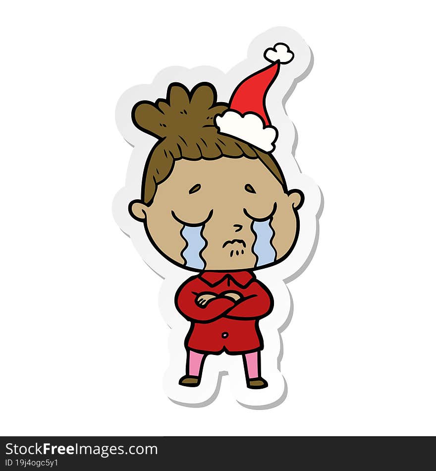 hand drawn sticker cartoon of a crying woman wearing santa hat